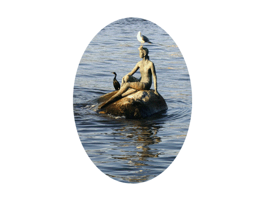 The Stanley Park mermaid in ‘meditative posture’ with two feathery guests - Vancouver BC Canada - The Eden Healing Centre. ©